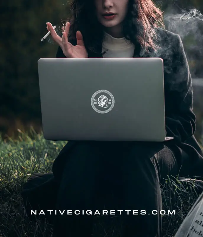woman searching for cigarettes on laptop